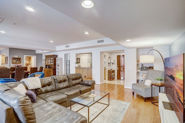 living room featuring light wood-type flooring