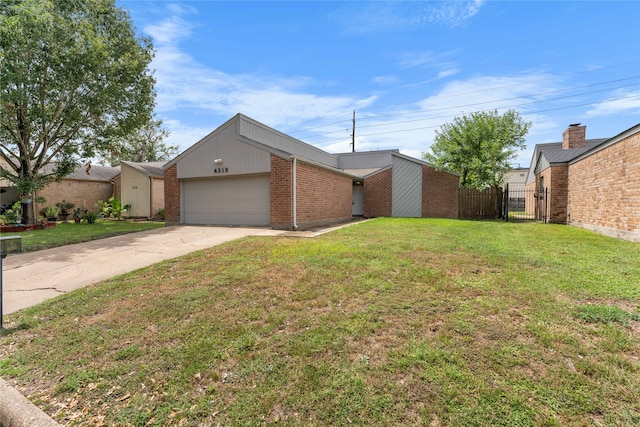 ranch-style house with a front yard and a garage