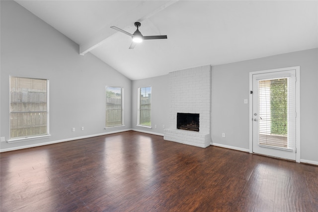 unfurnished living room featuring high vaulted ceiling, a fireplace, beamed ceiling, ceiling fan, and dark hardwood / wood-style floors