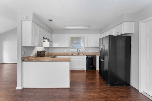 kitchen with dark wood-type flooring, white cabinets, a textured ceiling, black appliances, and sink