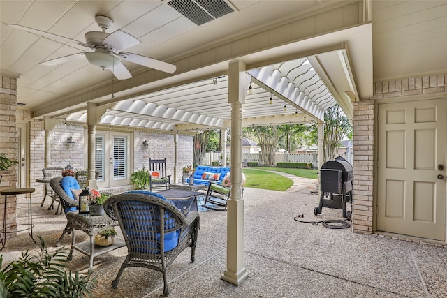 view of patio / terrace featuring a pergola, ceiling fan, and grilling area