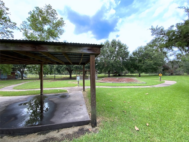 view of home's community featuring a yard