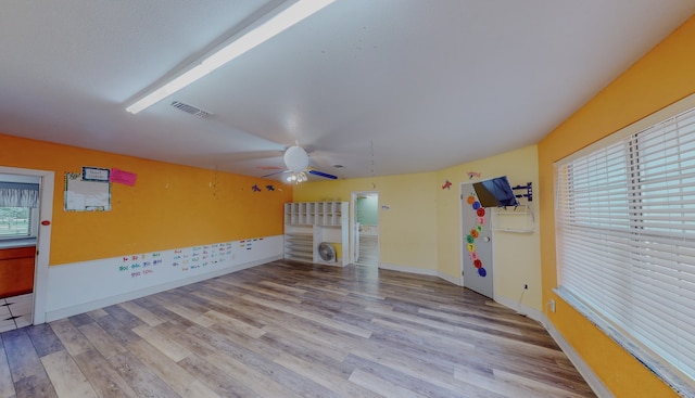 interior space featuring ceiling fan and wood-type flooring