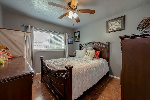 tiled bedroom featuring ceiling fan