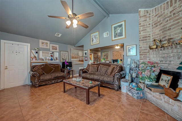 living room featuring ceiling fan, vaulted ceiling with beams, light tile patterned flooring, and brick wall