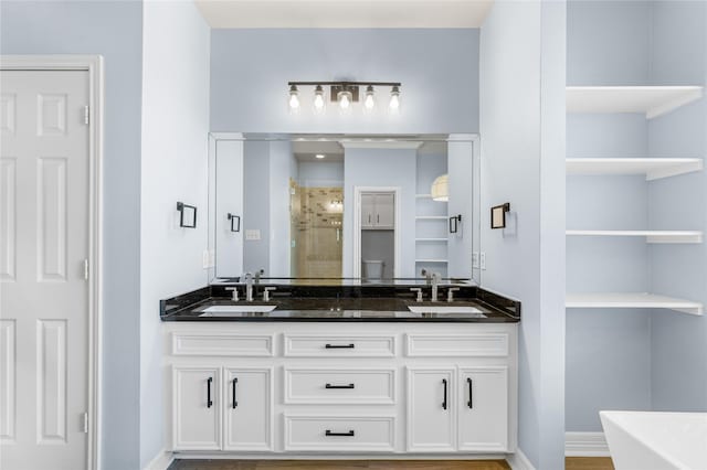 bathroom featuring vanity and separate shower and tub