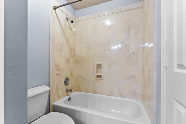 bathroom featuring toilet and bathtub / shower combination