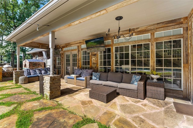 view of patio / terrace featuring an outdoor hangout area and french doors