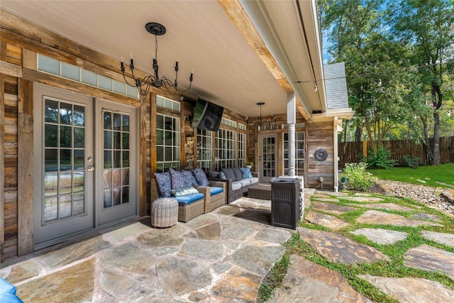 view of patio with outdoor lounge area and french doors