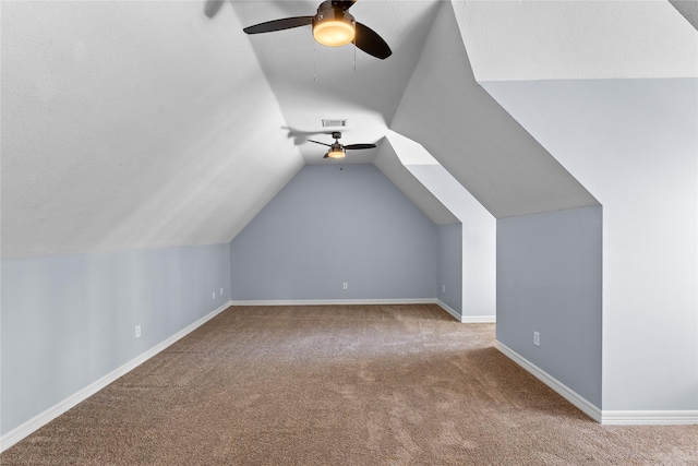 bonus room featuring carpet floors, ceiling fan, and lofted ceiling