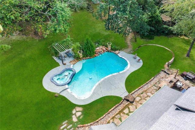 view of pool featuring a patio area and an in ground hot tub