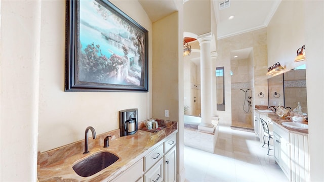 153 E Tuscany Way, Port O Connor, TX 77979 - bathroom with decorative columns, a walk in shower, double vanity, tile patterned flooring, and ornamental molding