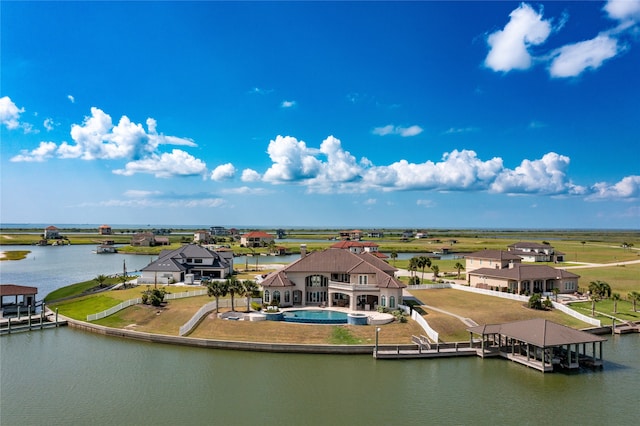 drone / aerial view with a water view