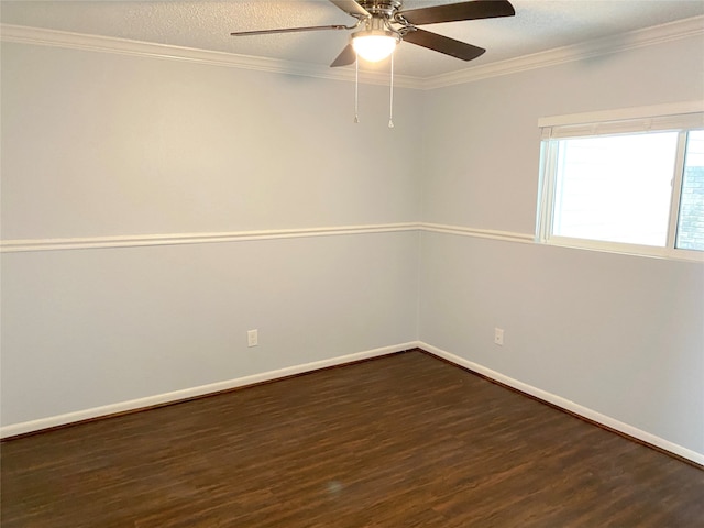 spare room featuring ornamental molding, dark hardwood / wood-style flooring, ceiling fan, and a textured ceiling