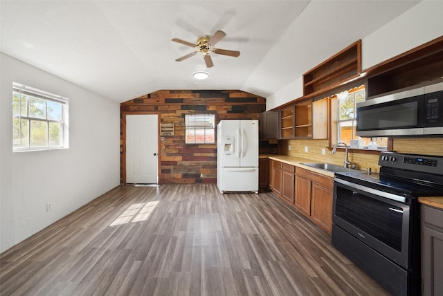 kitchen featuring a sink, open shelves, ceiling fan, appliances with stainless steel finishes, and dark wood-style flooring