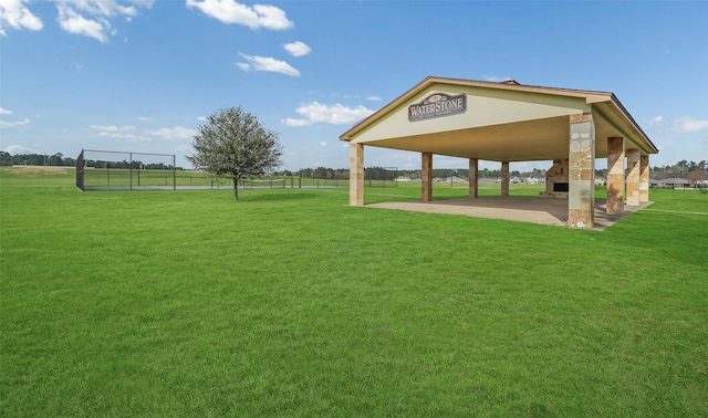 view of yard featuring a gazebo and a rural view