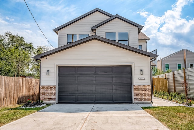 view of front of property with a garage