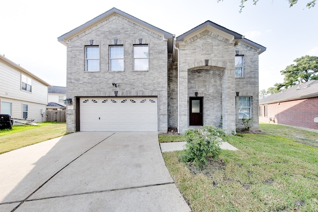 view of front of property with a front lawn and a garage