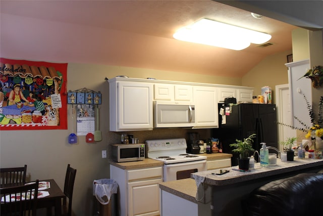 kitchen with black refrigerator, white cabinetry, kitchen peninsula, white electric range, and lofted ceiling