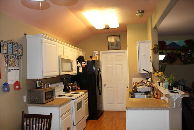 kitchen featuring electric stove, white cabinets, vaulted ceiling, light hardwood / wood-style floors, and sink