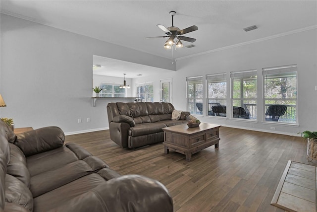 living room with ceiling fan, dark hardwood / wood-style floors, and ornamental molding