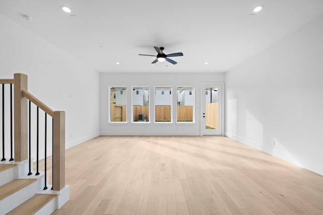 interior space featuring ceiling fan and light hardwood / wood-style floors