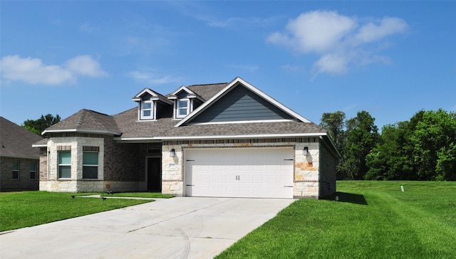 craftsman-style home featuring a garage and a front yard