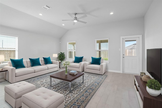 living area with lofted ceiling, recessed lighting, light wood-style floors, and visible vents