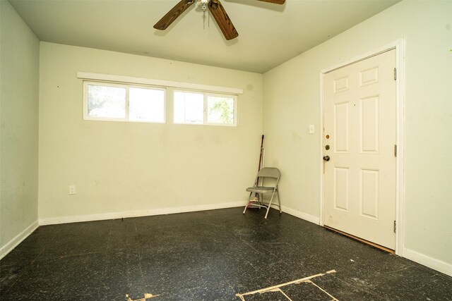 entrance foyer featuring ceiling fan