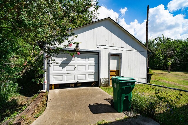 garage with a lawn