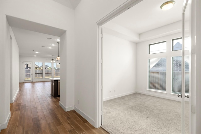 hallway featuring hardwood / wood-style floors