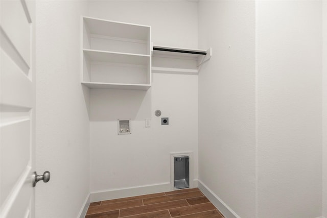 washroom with electric dryer hookup and dark hardwood / wood-style flooring