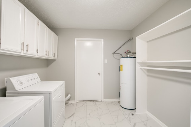 laundry room with independent washer and dryer, water heater, cabinets, a textured ceiling, and light tile patterned flooring