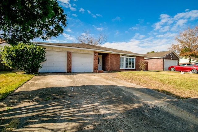 ranch-style house featuring a garage and a front yard