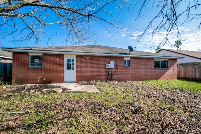 rear view of house featuring a patio