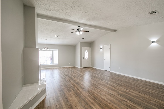 unfurnished room with ceiling fan with notable chandelier, hardwood / wood-style flooring, vaulted ceiling with beams, and a textured ceiling