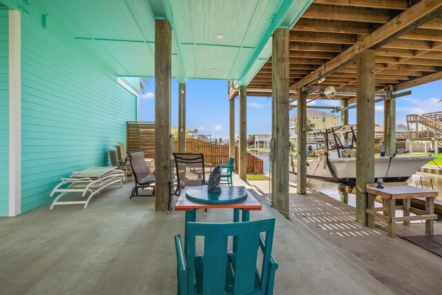 view of patio / terrace with a water view