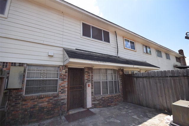 back of house featuring a patio