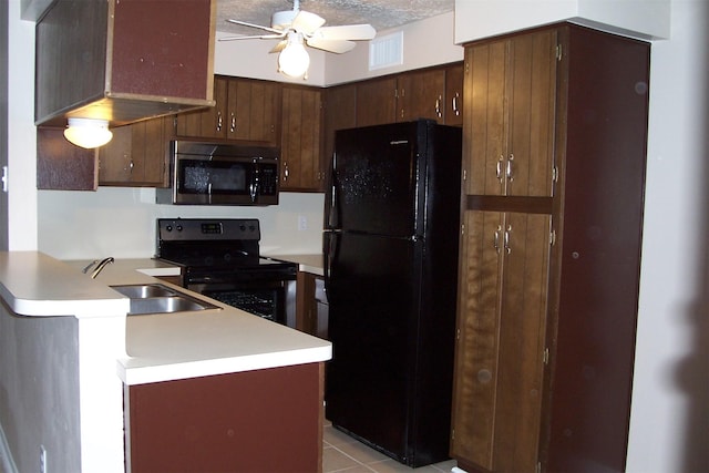 kitchen with premium range hood, kitchen peninsula, ceiling fan, black appliances, and sink