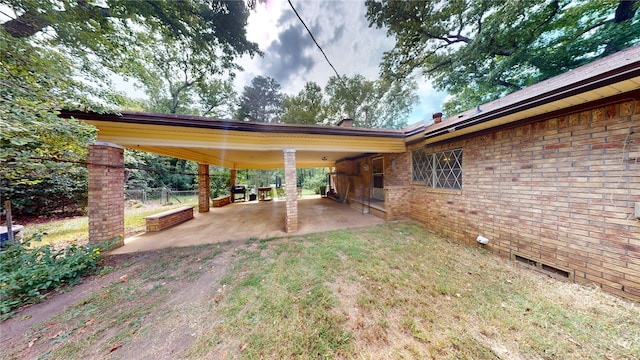 130 Dickey St, Bronson, TX 75930 - view of yard with a patio area and an attached carport