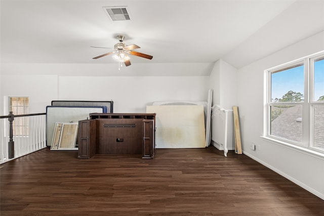 additional living space with dark wood-type flooring and ceiling fan