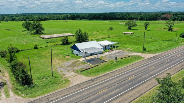 birds eye view of property featuring a rural view