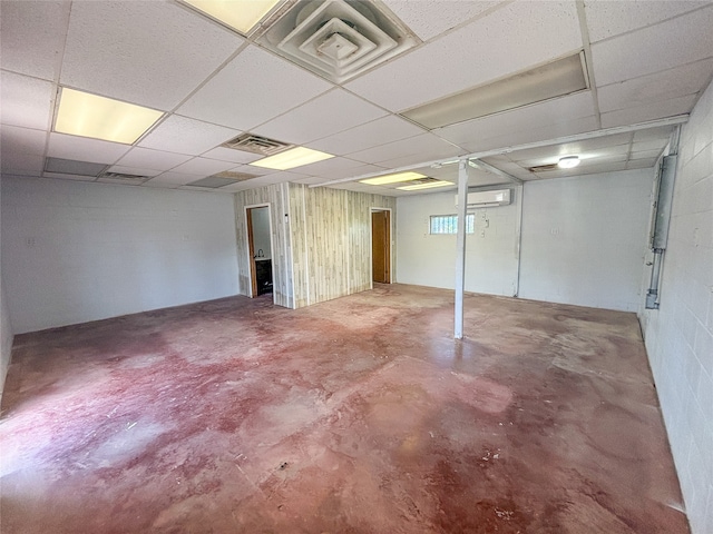 basement featuring a drop ceiling