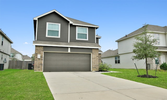 view of front of home with cooling unit, a garage, and a front lawn