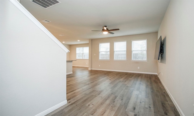 interior space featuring hardwood / wood-style flooring and ceiling fan