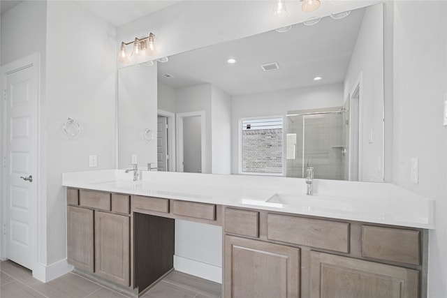 bathroom featuring vanity, an enclosed shower, and hardwood / wood-style floors