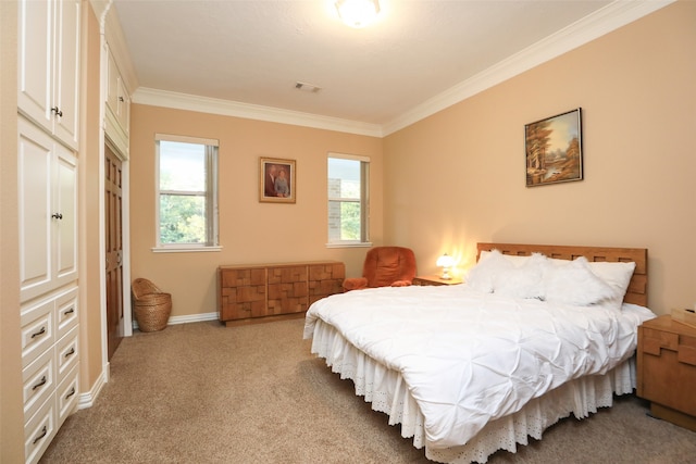 carpeted bedroom featuring ornamental molding