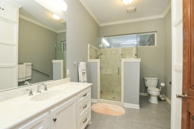 bathroom with vanity, toilet, crown molding, and a shower with shower door