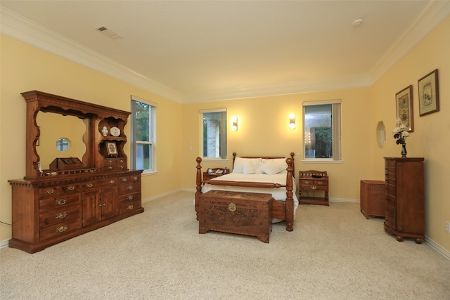 carpeted bedroom with crown molding