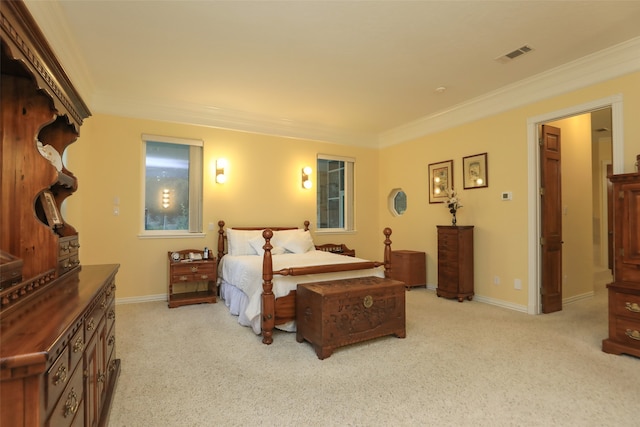 carpeted bedroom with crown molding